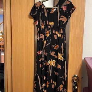 Decked out brand size 9/10 maxi dress drawstring waist and tie. Black floral